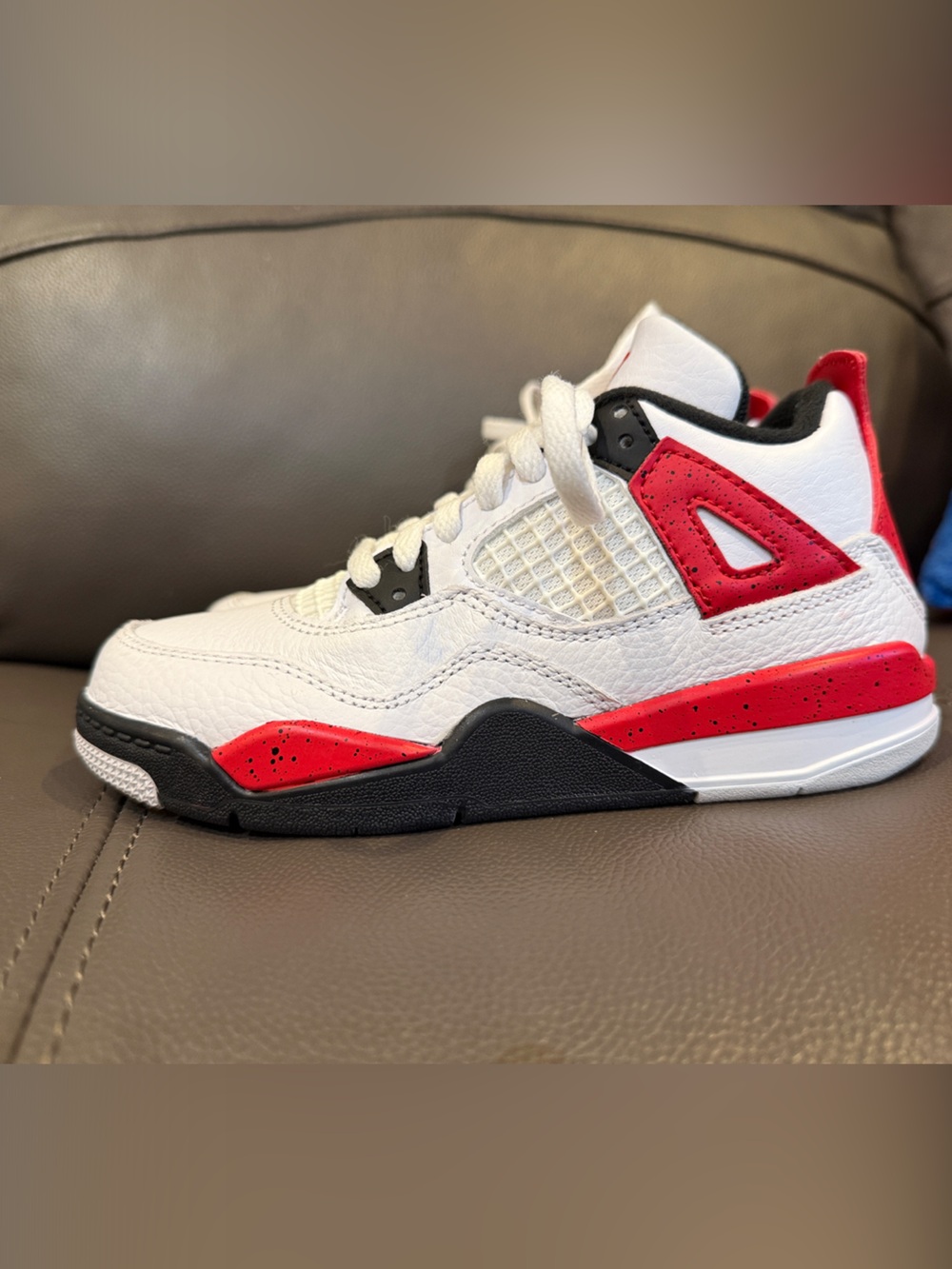 Kids Jordan retro 4s, white, black and red. New with no tags or box.